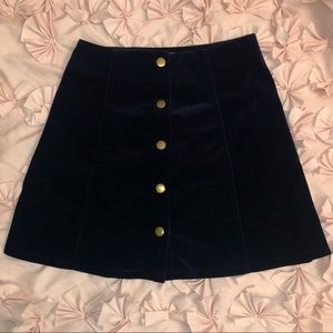 Bow and arrow corduroy skirt with gold buttons